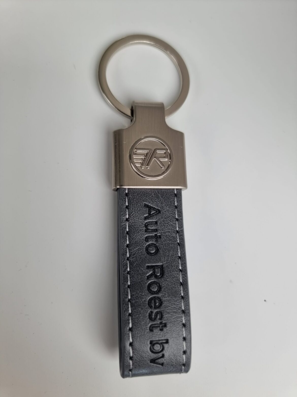 sleutelhanger de Luxe eingen logo